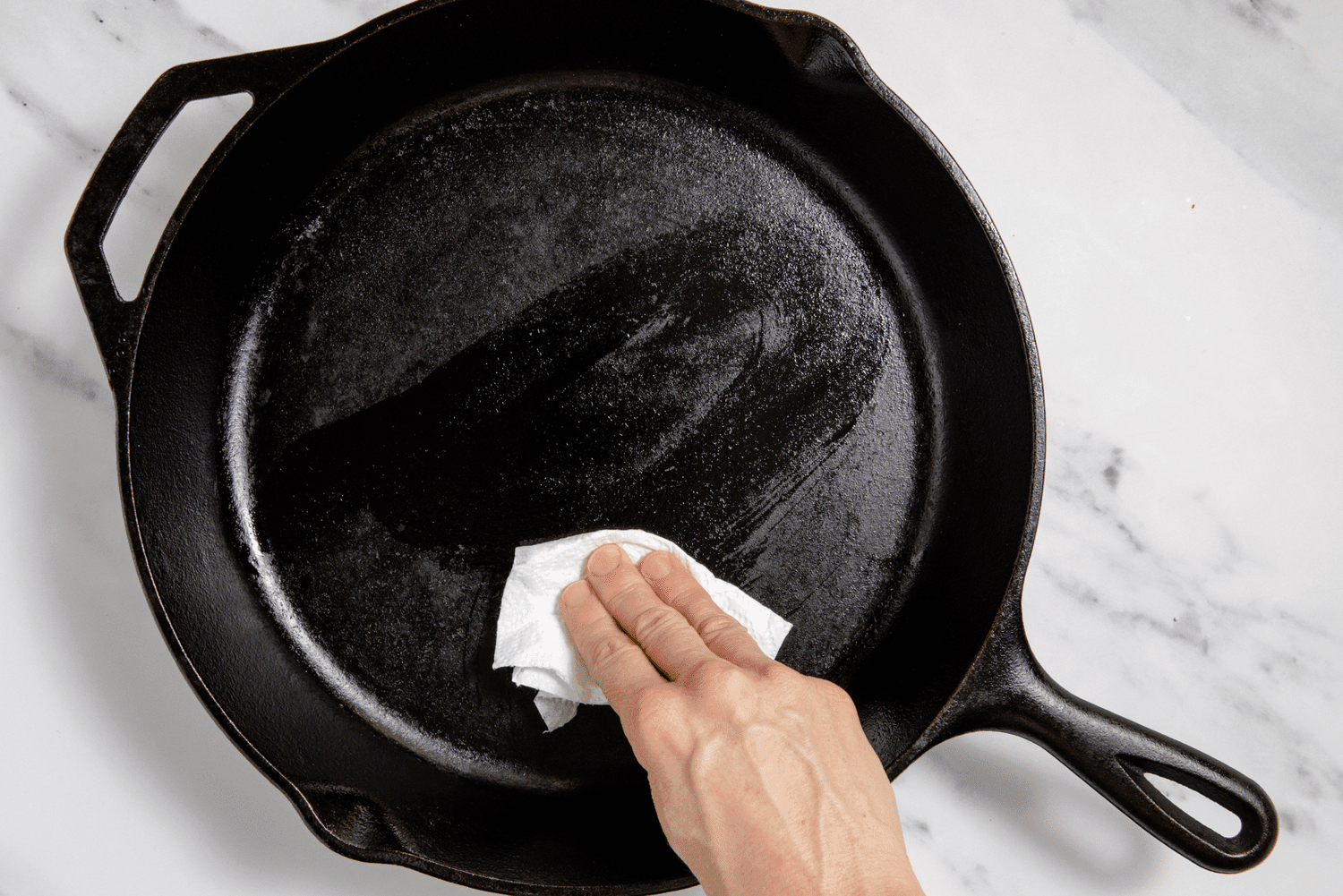 how to season cast iron without oven