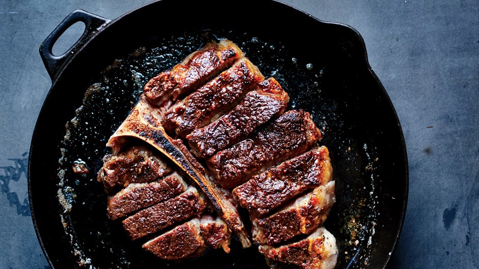 how to clean a cast iron skillet with burnt on the outside