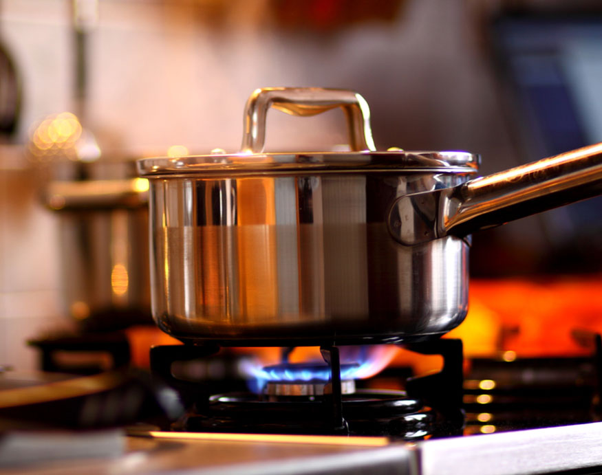 what is the correct way to to lift the lid off a saucepan