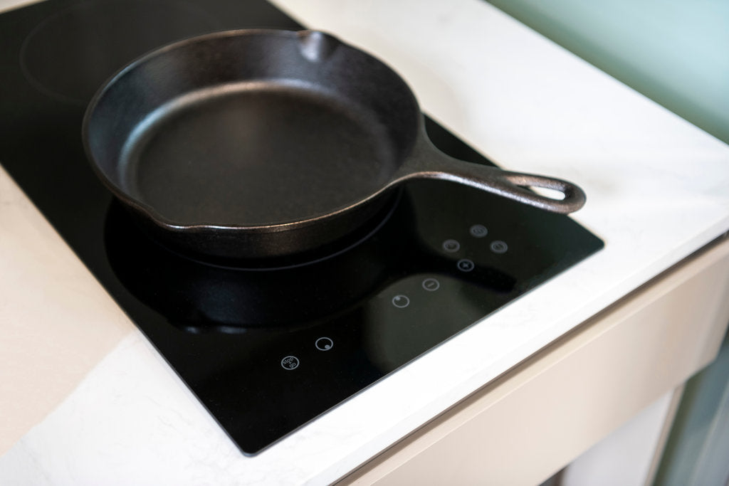 making pizza on cast iron with induction
