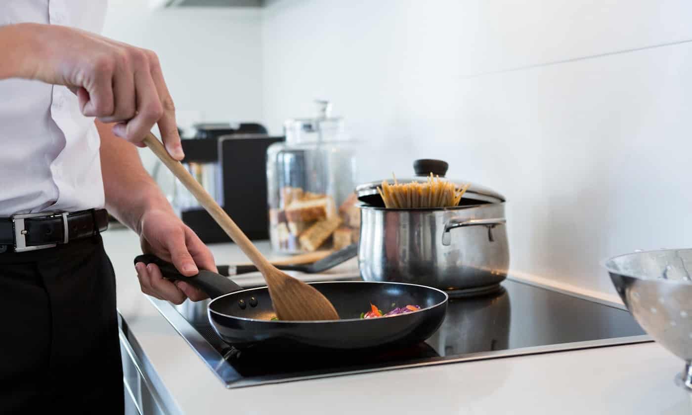 removing stains from induction after cast iron use